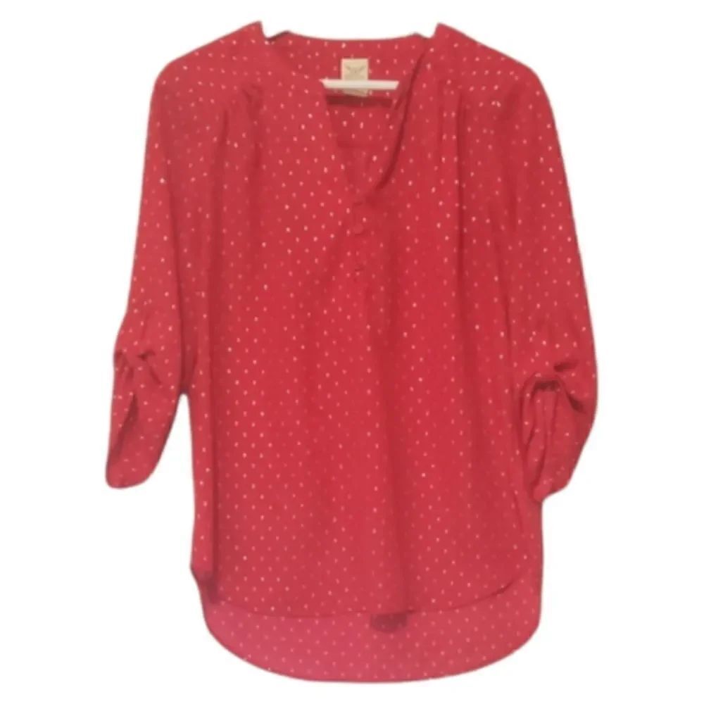 Radiant red blouse with silver detail